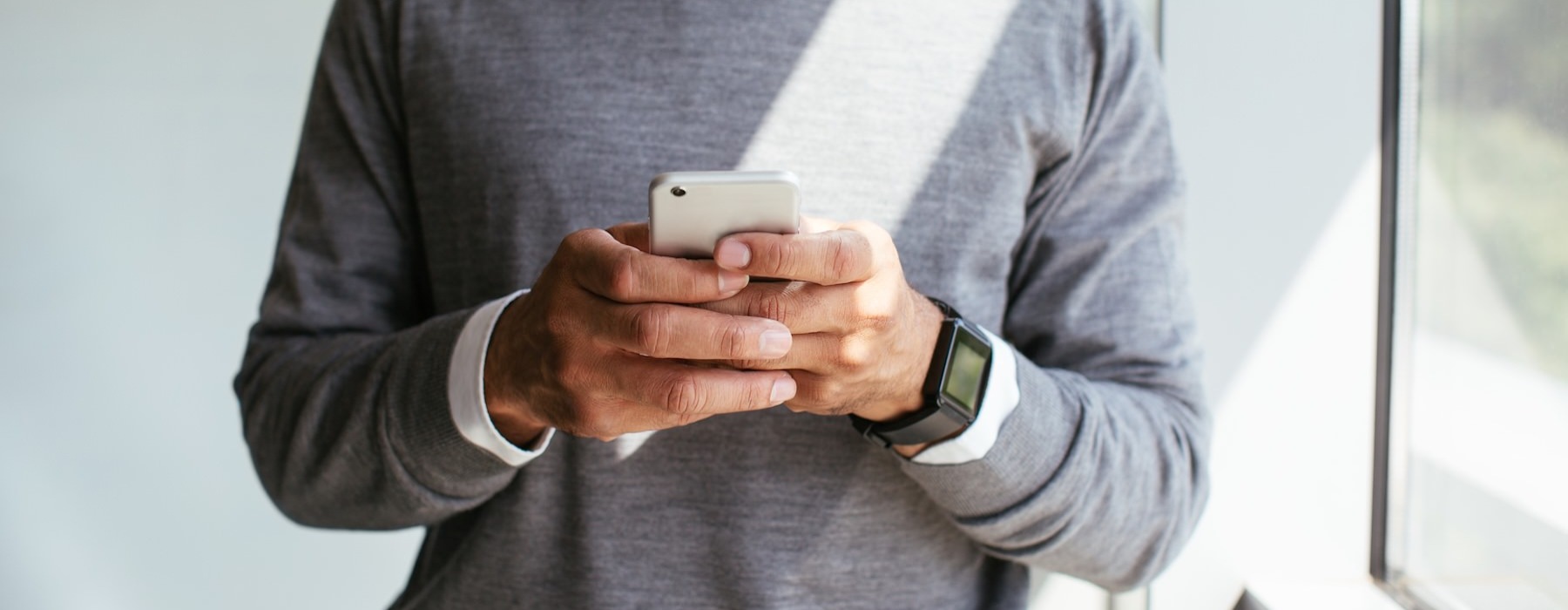 a man holding a phone