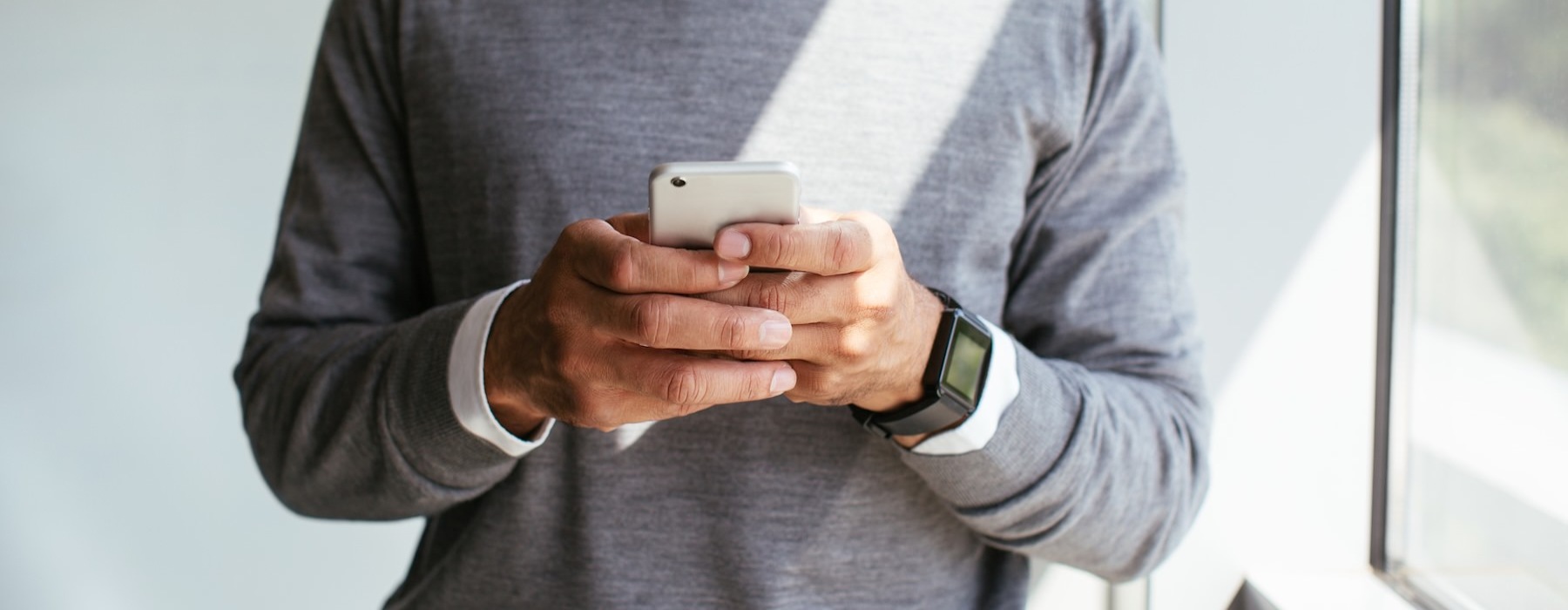 a man holding a phone