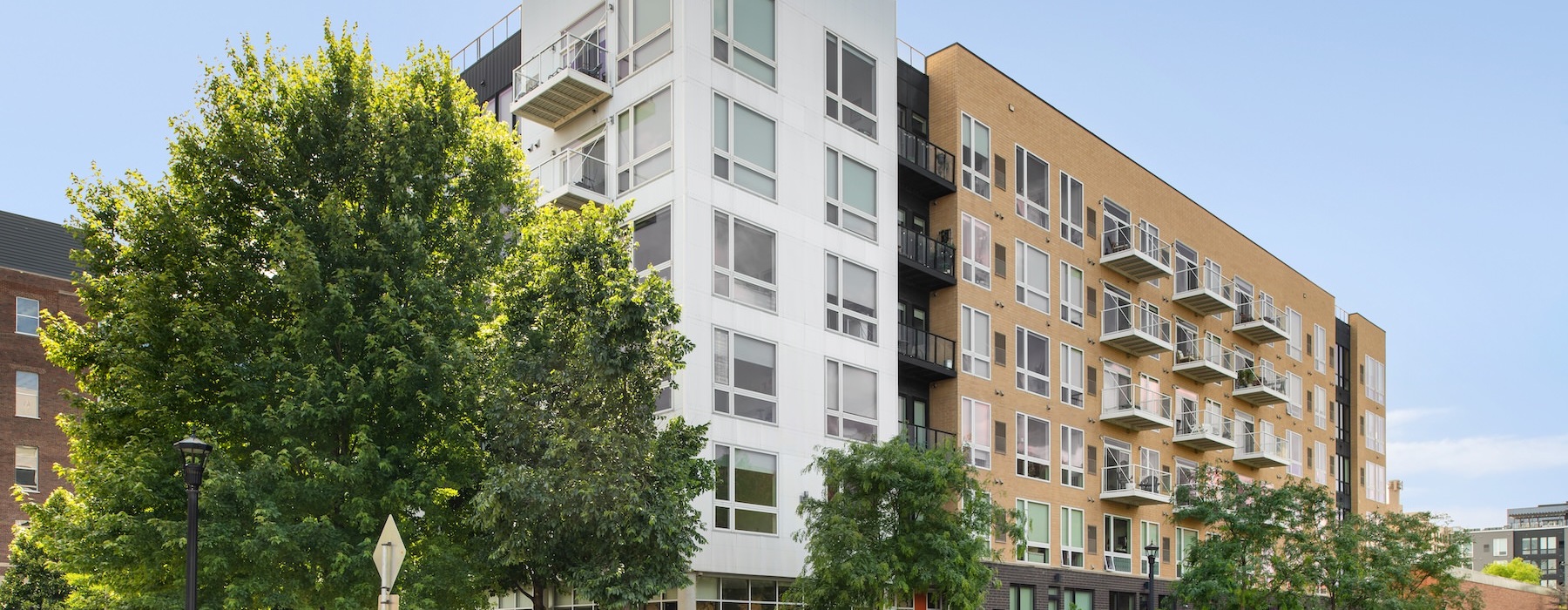 an apartment building with trees